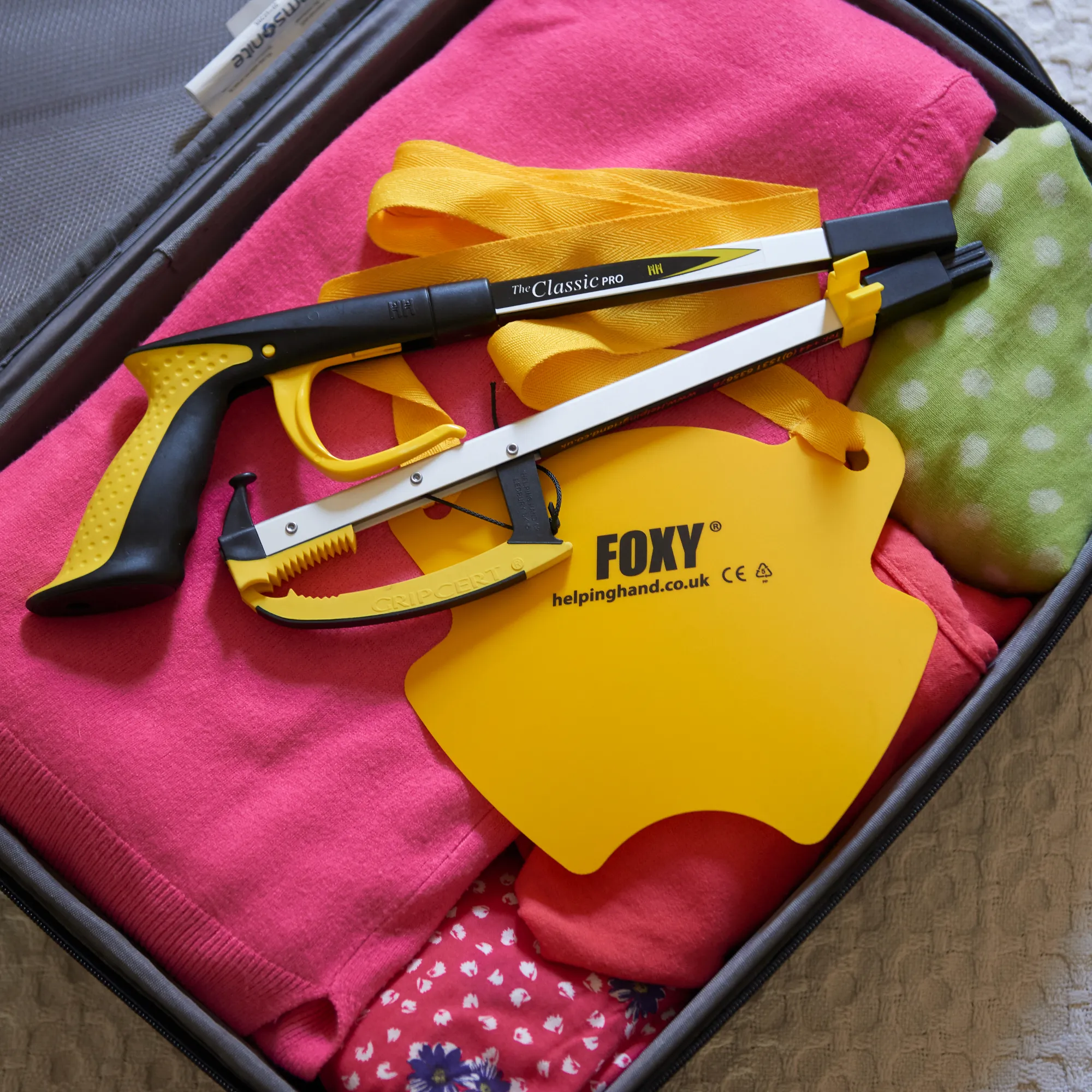 handgrijper en sokaantrekker in koffer