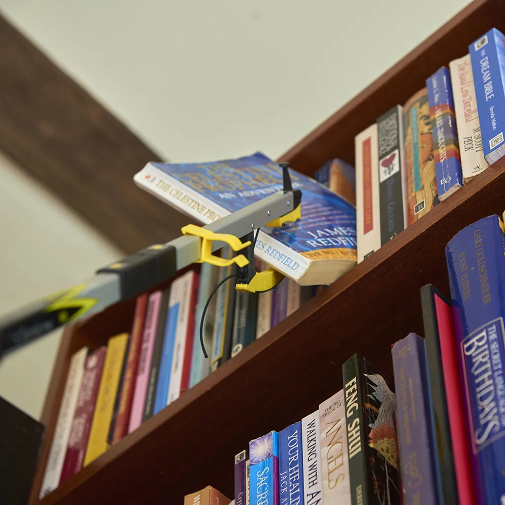 opvouwbare handgrijper boek pakken